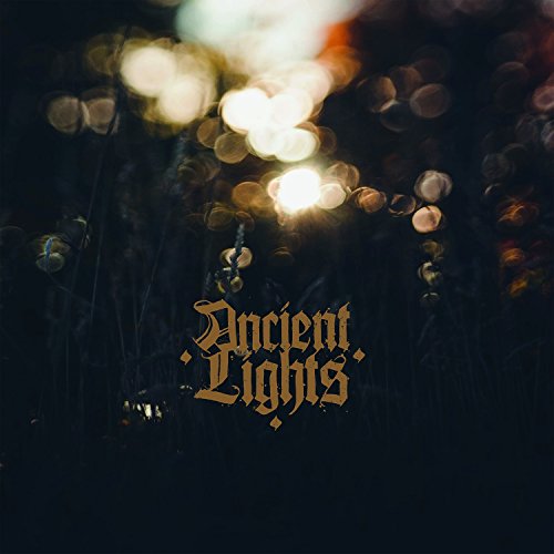 CD cover for "Ancient Lights" with blurred lights and ornate text.