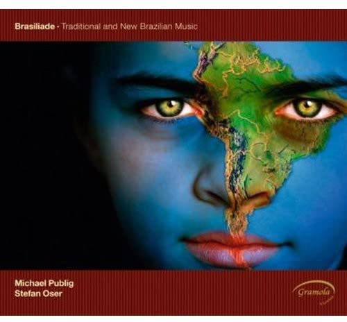 CD cover: face with map of South America overlaid on features.