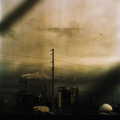 CD cover: stormy sky over industrial landscape with power lines.