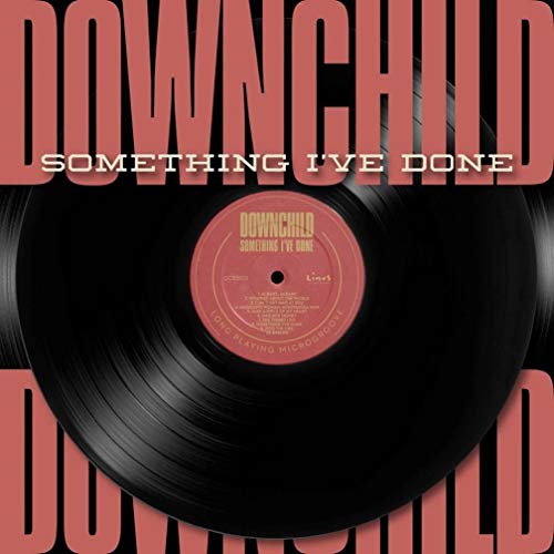 Downchild album cover featuring a vinyl record with red text.