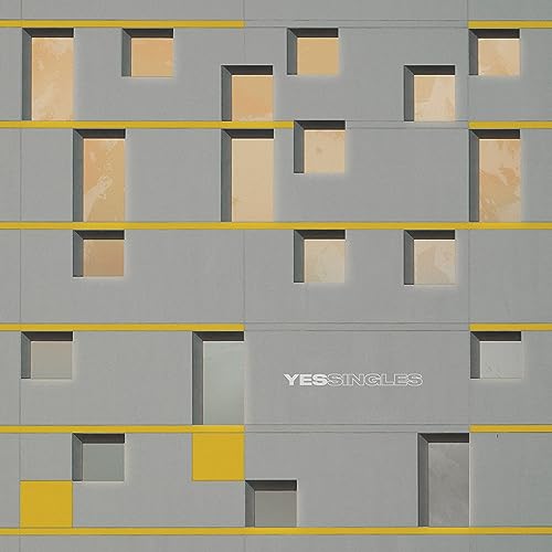 Album cover: gray building facade with yellow and orange window details.