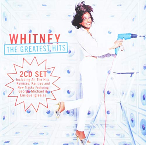 Whitney Houston album cover: she’s on a ladder with a drill.