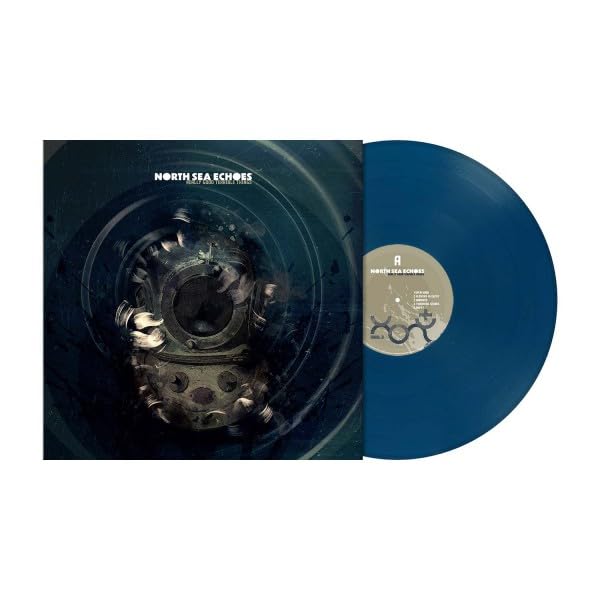 Vinyl record with dark blue coloring and cover featuring underwater machinery.