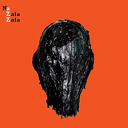 A black, glossy, melted head sculptureCulpture centered on a bright orange background.