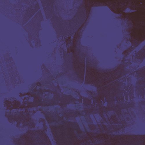 Purple-toned album cover featuring blurred faces and abstract shapes.