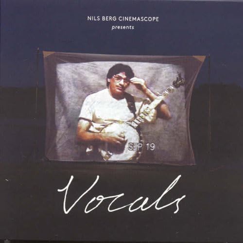 CD cover: man with a mandolin framed by a white canvas.