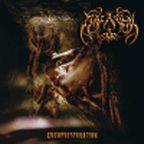 Dark album cover with ornate gold lettering and a blurred face.