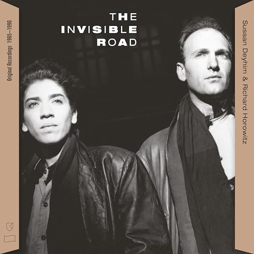 Album cover for "The Invisible Road" featuring two men in dark clothing.