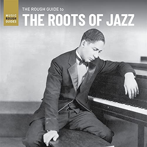 Album cover featuring a vintage photo of a man at a piano.