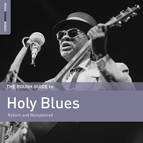 CD cover featuring a Black blues musician playing guitar with a microphone.