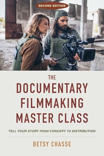Book cover: filmmakers with camera, title “The Documentary Filmmaking Master Class.”