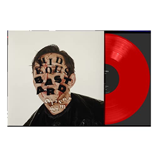 Oliver Sim vinyl record with a portrait cover and red disc.