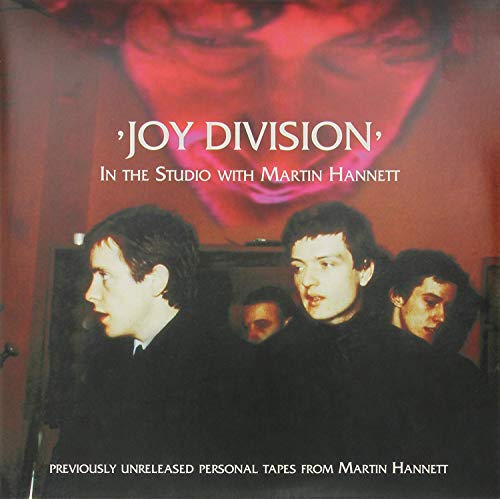 Joy Division album cover with band members and red abstract image.