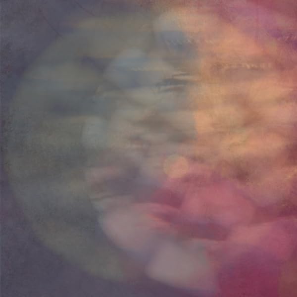 Blurred, abstract portrait with warm and cool color tones.