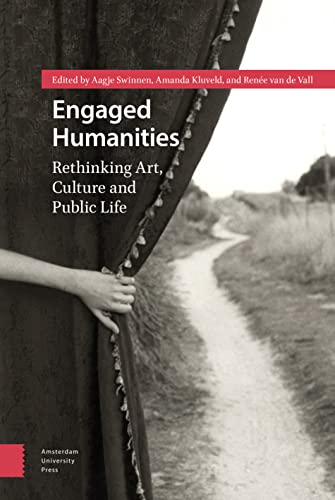 Book cover with hand holding dark fabric, landscape background.