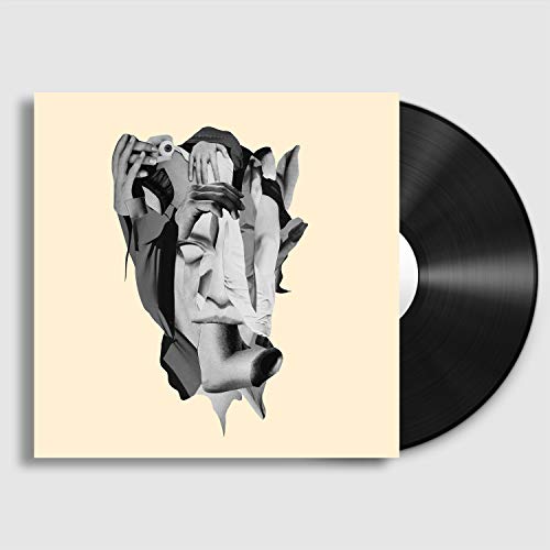 Milk Teeth" vinyl record with abstract collage cover art and black disc.