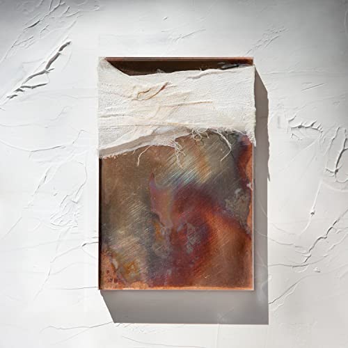 Rectangular vinyl record packaging with textured, marbled brown and white surface.