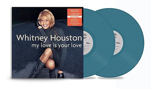 Whitney Houston album cover and two teal vinyl records.