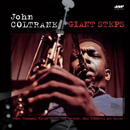 John Coltrane playing saxophone on the album cover “Giant Steps”.