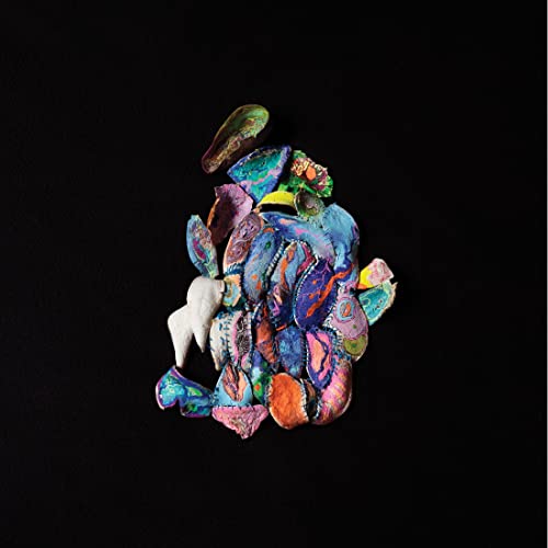 Colorful, abstract collage on black background; vinyl record cover art.