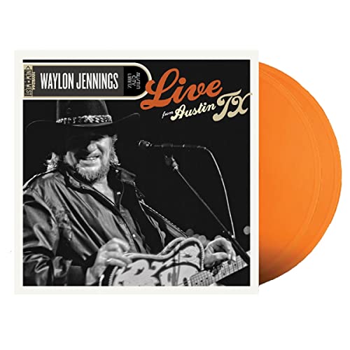 Waylon Jennings album cover with orange vinyl record beside it.