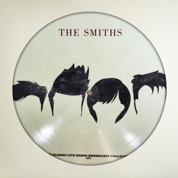 The Smiths vinyl record, clear with black silhouette figures.