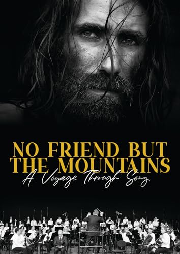 DVD cover: close-up of a man’s face over a mountain and orchestra scene.