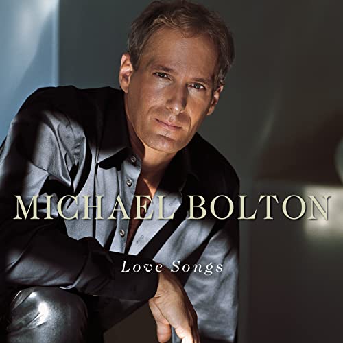 Michael Bolton album cover, portrait of the singer in a dark jacket.