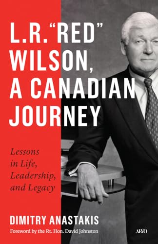 Book cover featuring portrait of L.R. “Red” Wilson in a suit and tie.