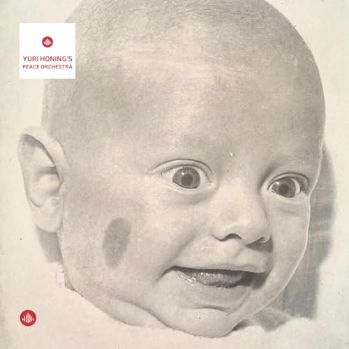 Black and white album cover featuring a smiling baby's face.