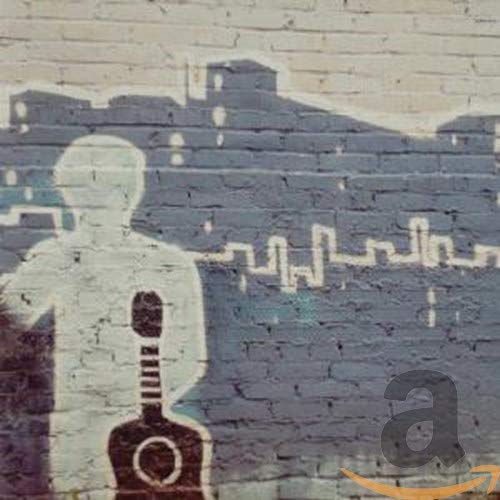 CD cover: white silhouette of a guitarist on a brick wall.