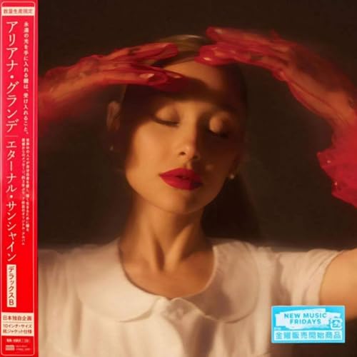 Ariana Grande album cover, “Eternal Sunshine,” with red abstract shapes.