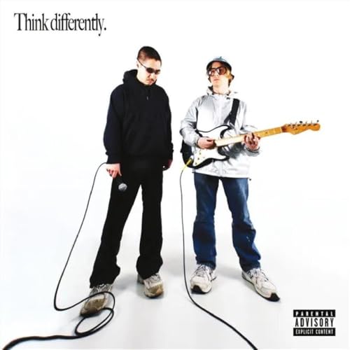 Album cover: two men with guitars, cables, and parental advisory label.