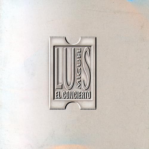 Silver album cover with embossed lettering "LUIS MIGUEL EL CONCIERTO".