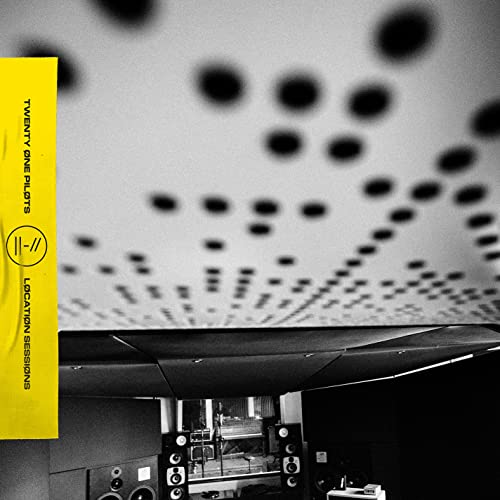 Yellow album cover for Twenty One Pilots’ “Location Sessions” vinyl record.