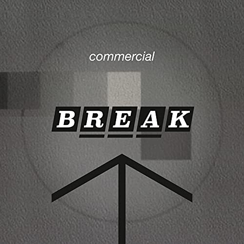 CD cover for Blancmange’s “Commercial Break” with text and arrow graphic.