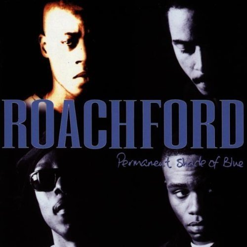Roachford album cover featuring four Black men in a dark, moody portrait.