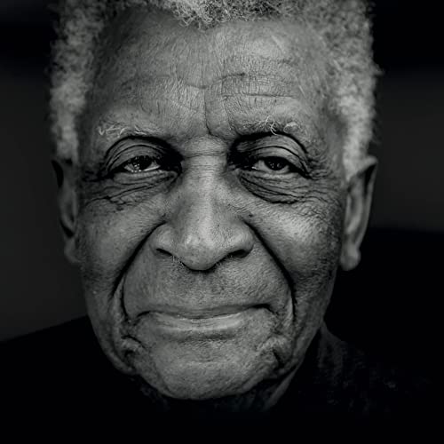 Black and white portrait of Abdullah Ibrahim, a jazz pianist.