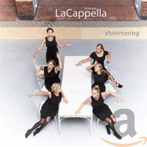 CD cover featuring six performers in black clothing around a table.