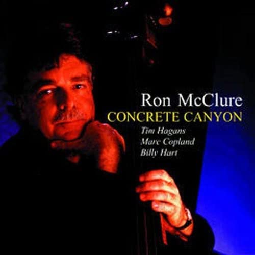 CD cover for Ron McClure’s “Concrete Canyon” featuring a portrait of the artist.