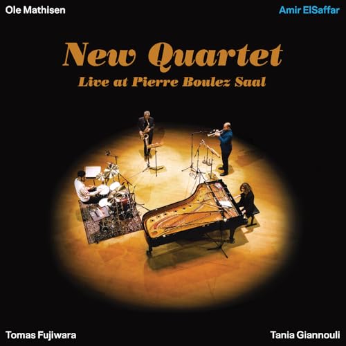 CD cover featuring a jazz quartet performing on a warmly lit stage.