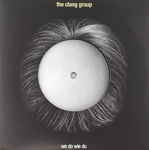Black vinyl record cover with a white, furry circular design.
