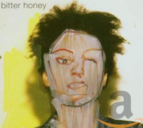 CD cover: Portrait of a person with abstract yellow paint strokes.