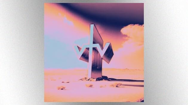 Album cover with a large, angular cross in a desert landscape.