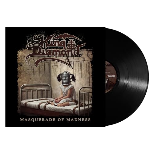 King Diamond “Masquerade Of Madness” vinyl record with unsettling cover art.