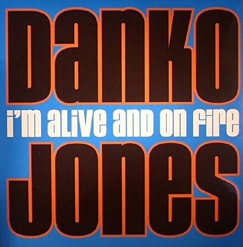 Vinyl record cover: "Danko Jones - I'm Alive and on Fire" in bold text.