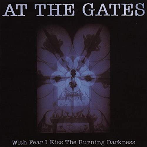At The Gates album cover: dark, abstract floral design with text.
