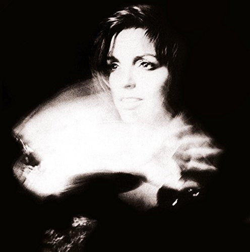 Black and white portrait of Liza Minnelli with blurred, abstract effects.