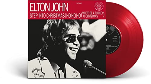 Red vinyl record with Elton John’s portrait on the cover.