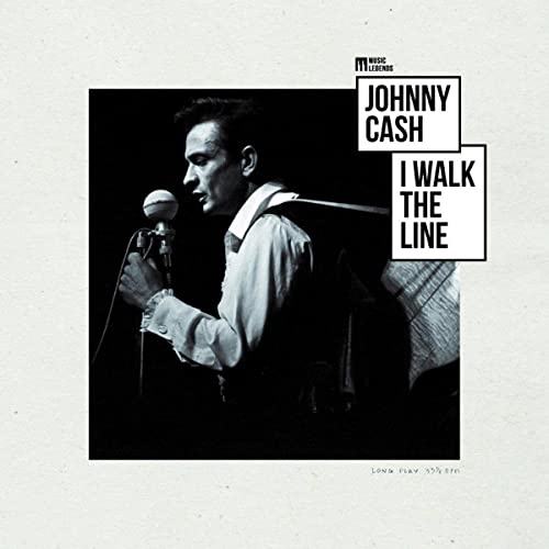 Johnny Cash album cover, black and white portrait singing into a microphone.